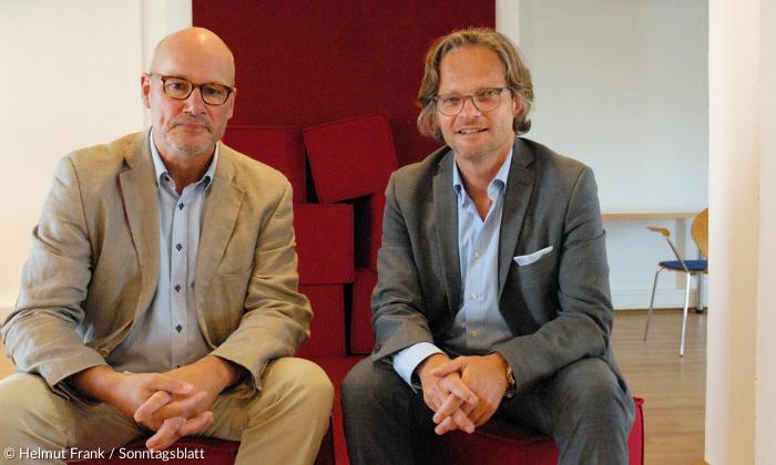 Thies Gundlach, Cheftheologe der EKD, und der Münchner Theologieprofessor Jörg Lauster, der die inhaltliche Ausrichtung des Reformationsjubiläums kritisiert.