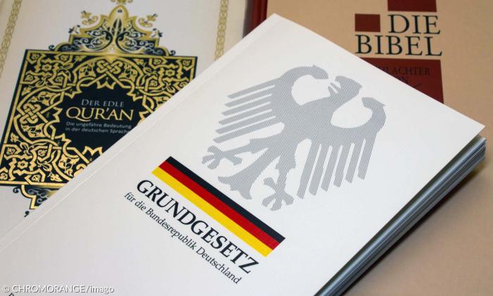Grundgesetz und Koran.