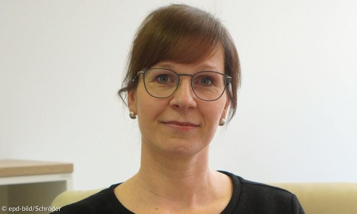 eine Frau mit Brille