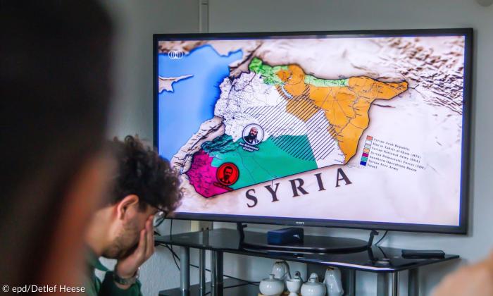Bildschirm zeigt Syrien