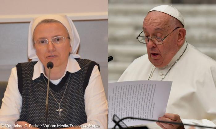 Eine Frau im Ordensgewand und der Papst in weißem Gewand