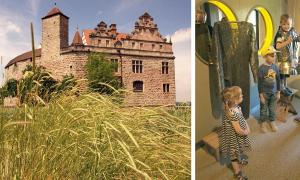 »Kinderführer« Maximilian Keck mit Lea, Florian und Jakob in der Ausstellung der Burg Cadolzburg bei Fürth.