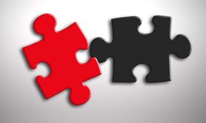 Puzzleteile rot und schwarz