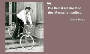 Joseph Beuys mit Fahrrad in Düsseldorf